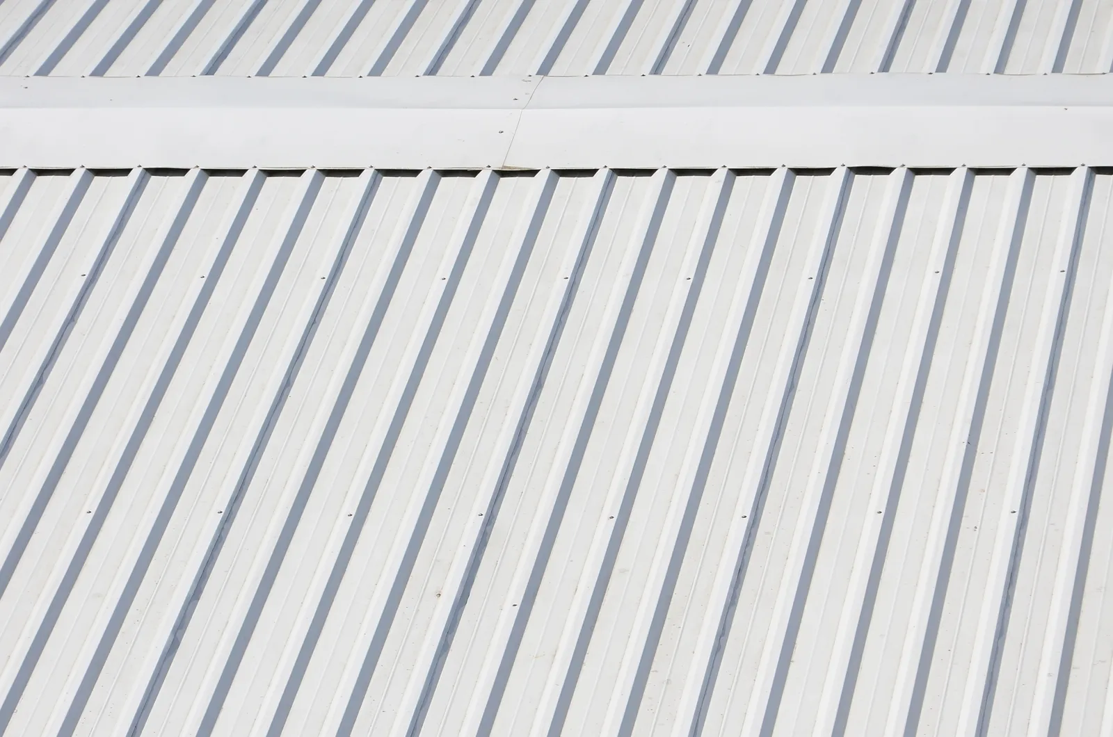 Close-up of white box profile metal roof cladding on a commercial building