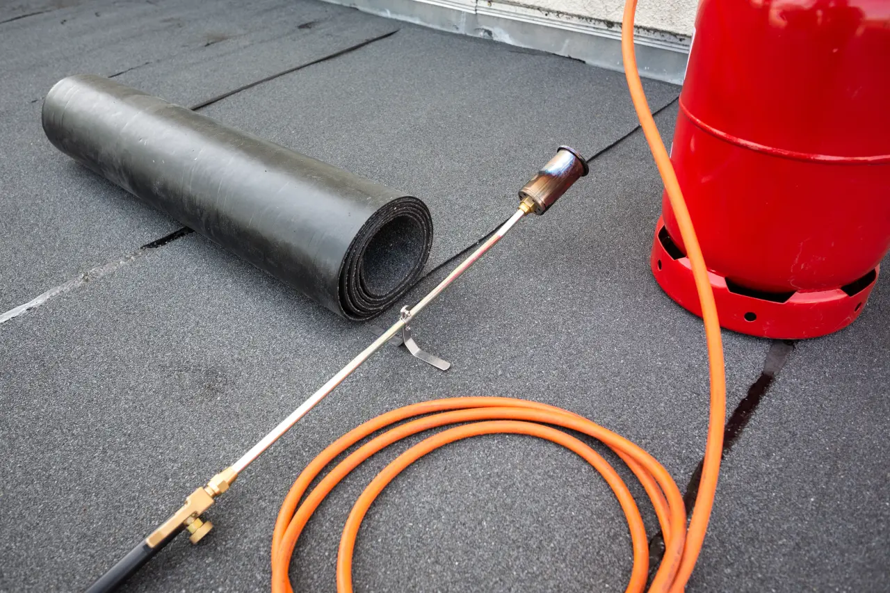 Flat roof repair by Vanguard Roofing Services