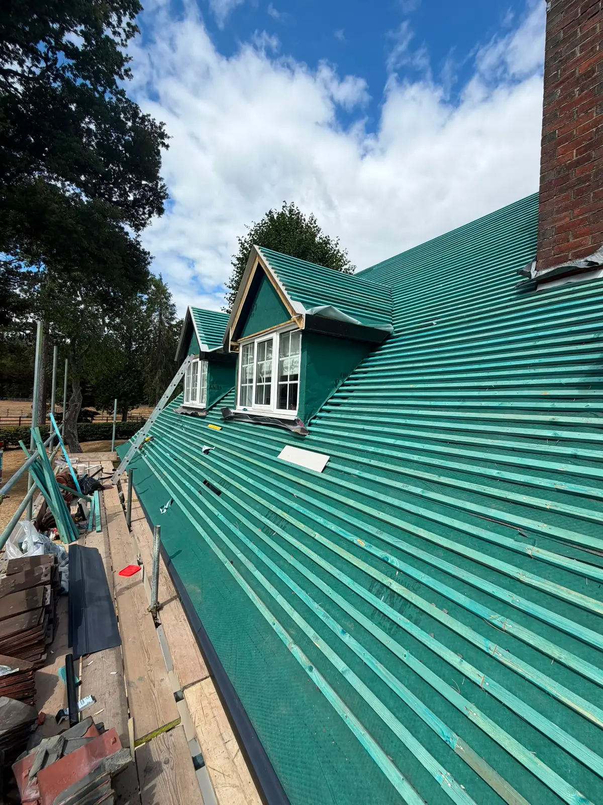 New battens and breathable membrane across the dormers during a Newbury re-roof